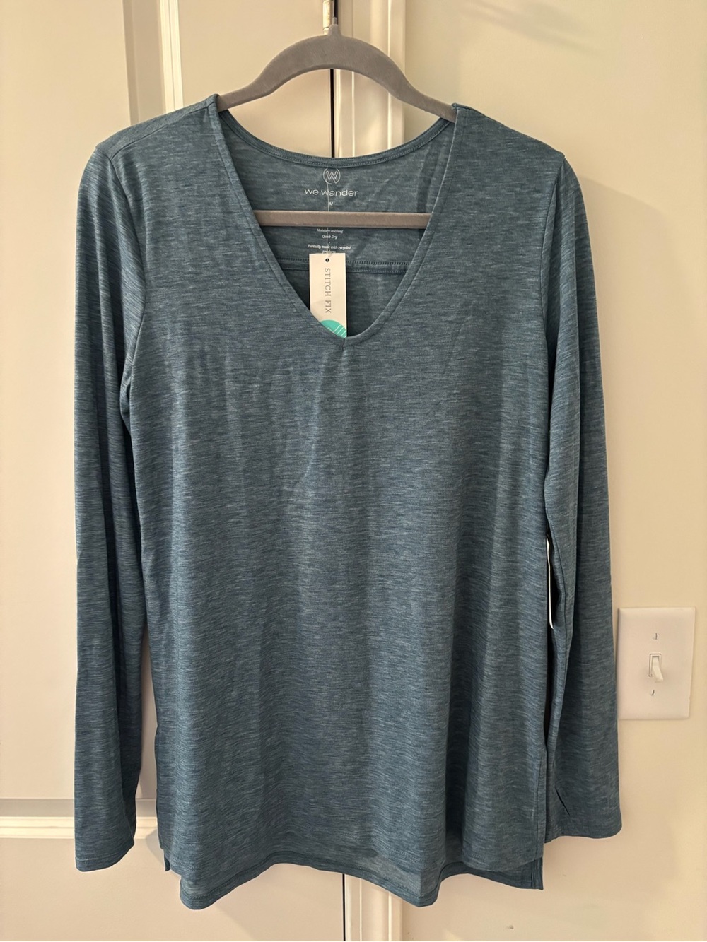 We Wander NWT blue long sleeve top size M